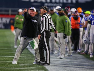 Duke head coach Mike Elko makes his case to the referee during the second quarter of the Military Bowl.