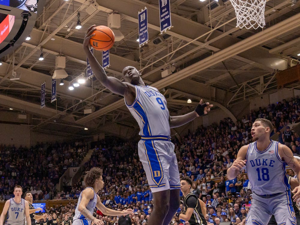 Maluach grabs one of his 14 rebounds on the night. 