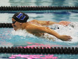 The Blue Devils rewrote the record books Saturday at Taishoff Aquatic Pavilion, beating Pittsburgh in the process.