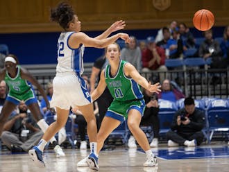 Taina Mair flicks the ball to a teammate during Duke's win against Florida Gulf Coast.