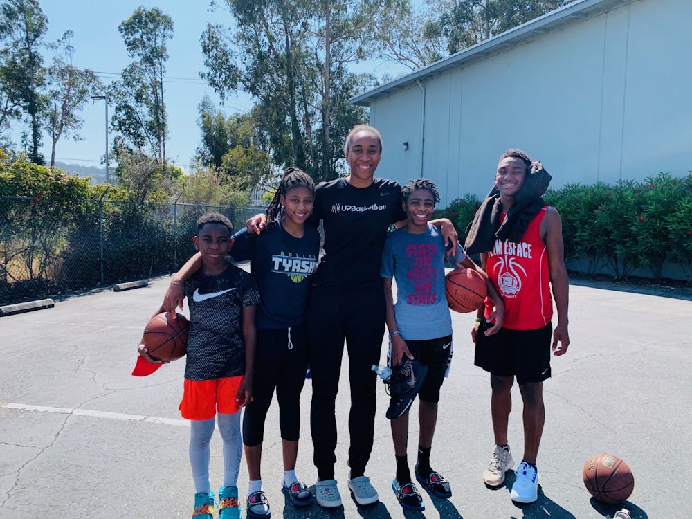 Chidom (center) has goals to spread The Big Homie Project to Durham.