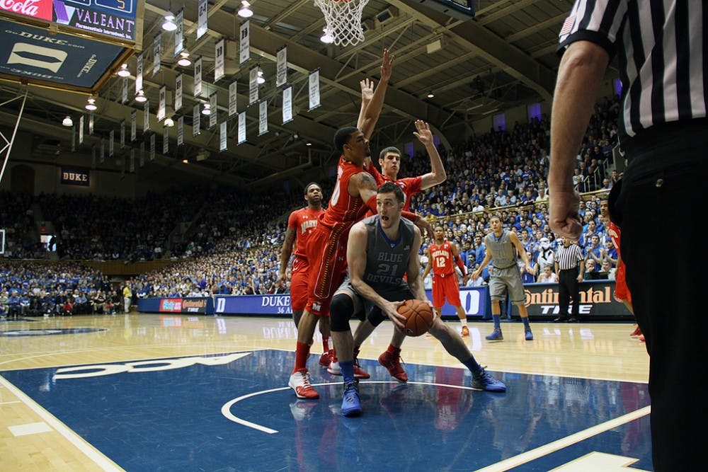 Miles Plumlee had 13 points and 22 rebounds to help Duke past Maryland, 73-55.
