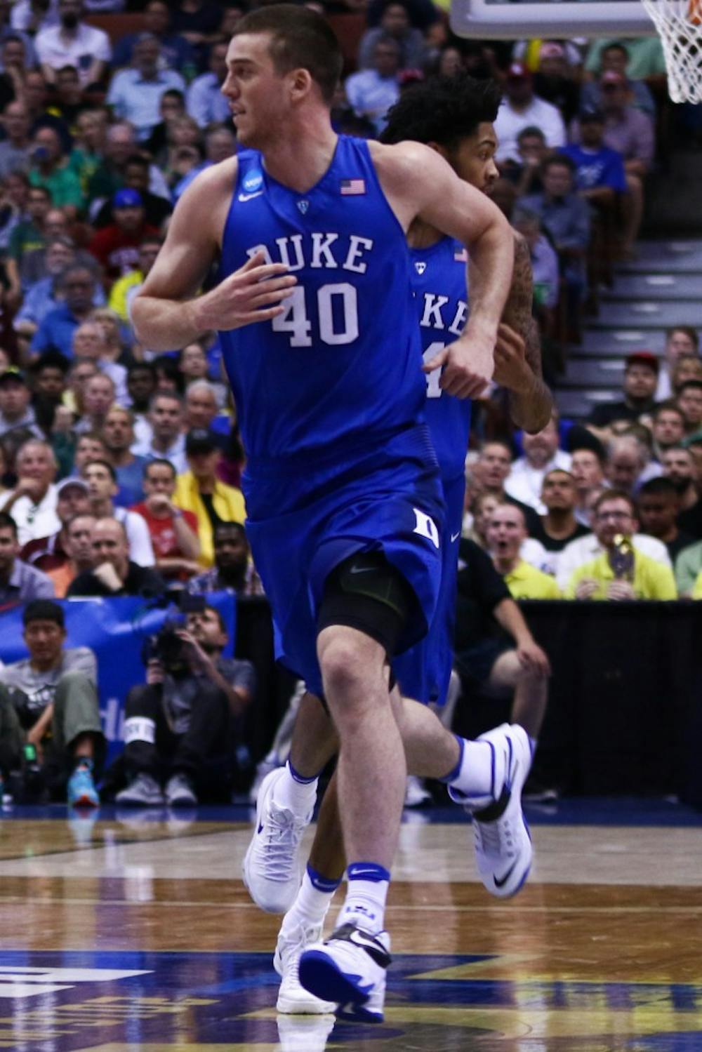 <p>Marshall Plumlee's Duke career came to an end Thursday with six points and five rebounds in the Sweet 16 loss to Oregon.</p>