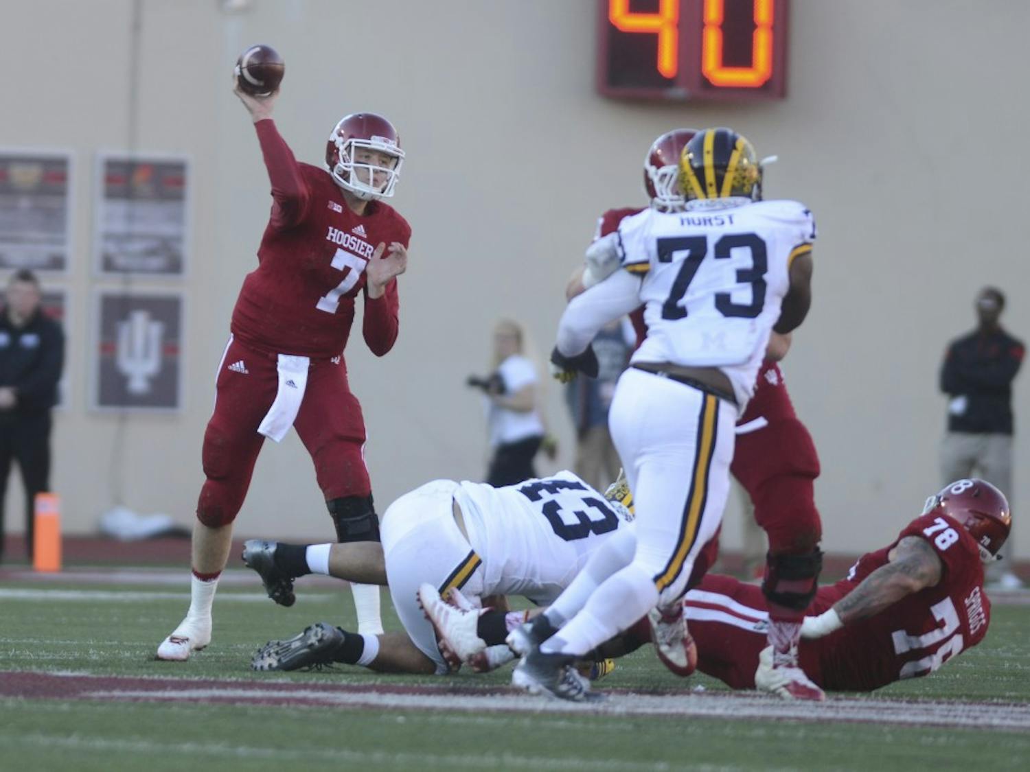 Quarterback Nate Sudfeld passes the ball during the against Michigan on Saturday at Memorial Stadium. The Hoosiers lost in double overtime, 41-48.