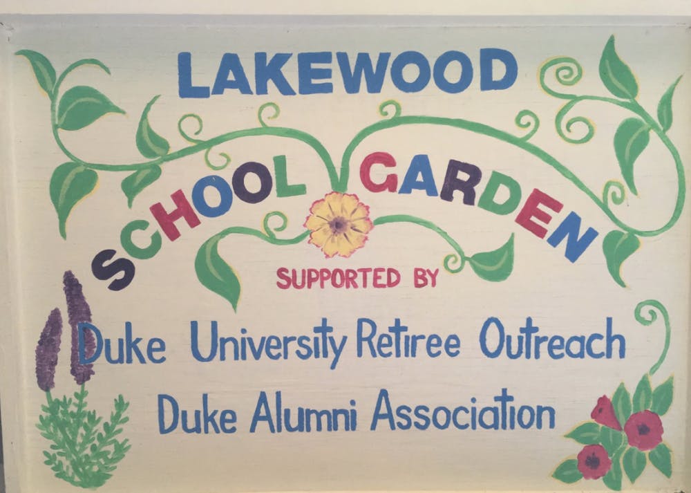 <p>Volunteers from Duke University Retiree Outreach help manage the school garden at&nbsp;Lakewood Elementary, a Title I school in Durham.</p>