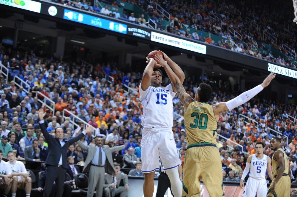 Jahlil Okafor's 28 points weren't enough as Duke's comeback bid fell short in the semifinals of the ACC tournament.