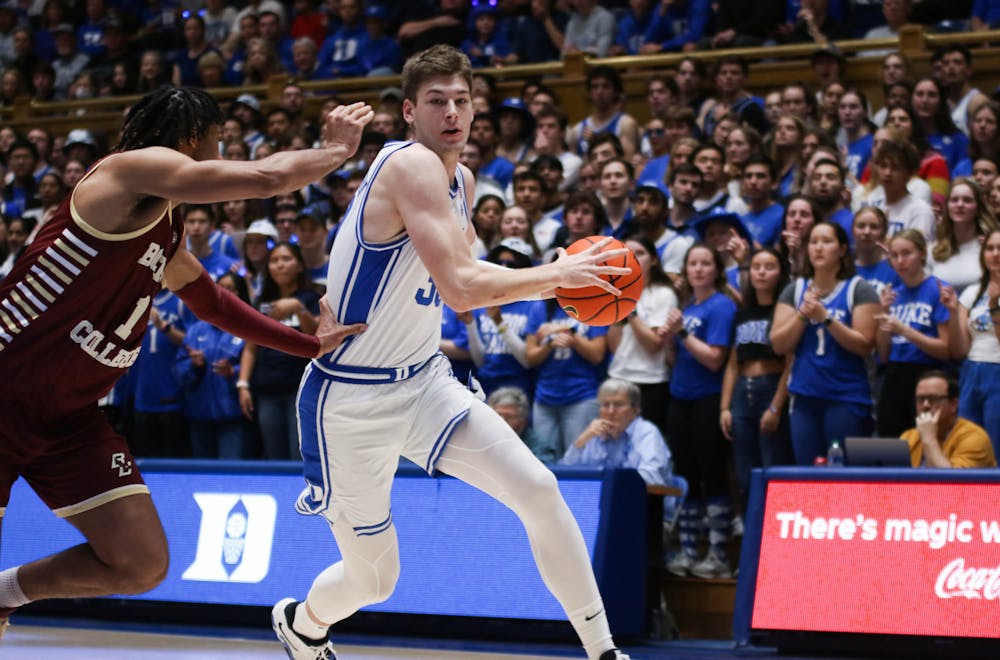 Kyle Filipowski drives to the hoop during the first half of Duke's win against Boston College at Cameron Indoor Stadium.