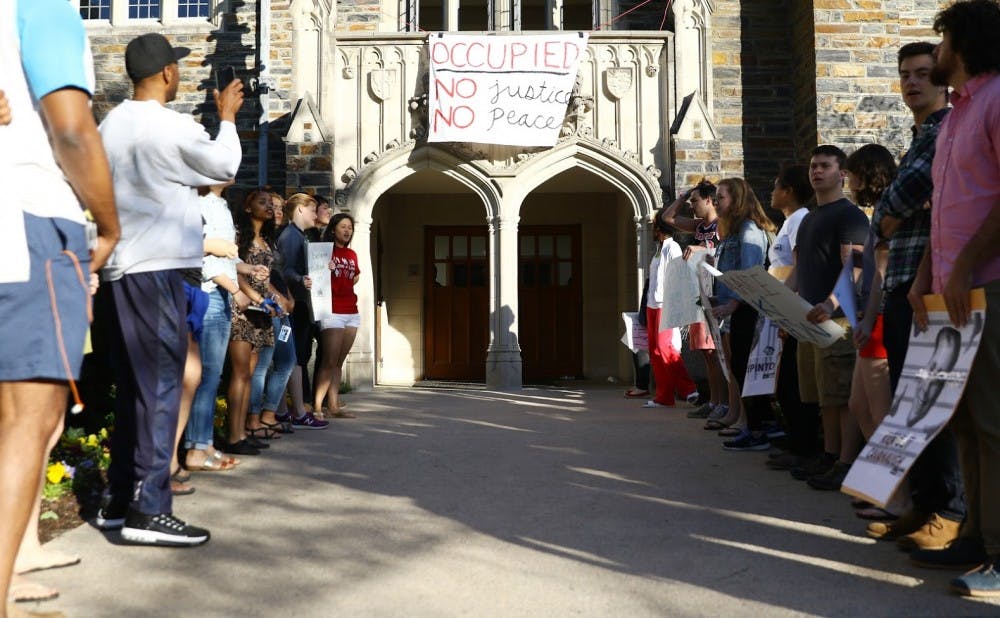 Students gathered to find out what administrators had told those inside the Allen Building.