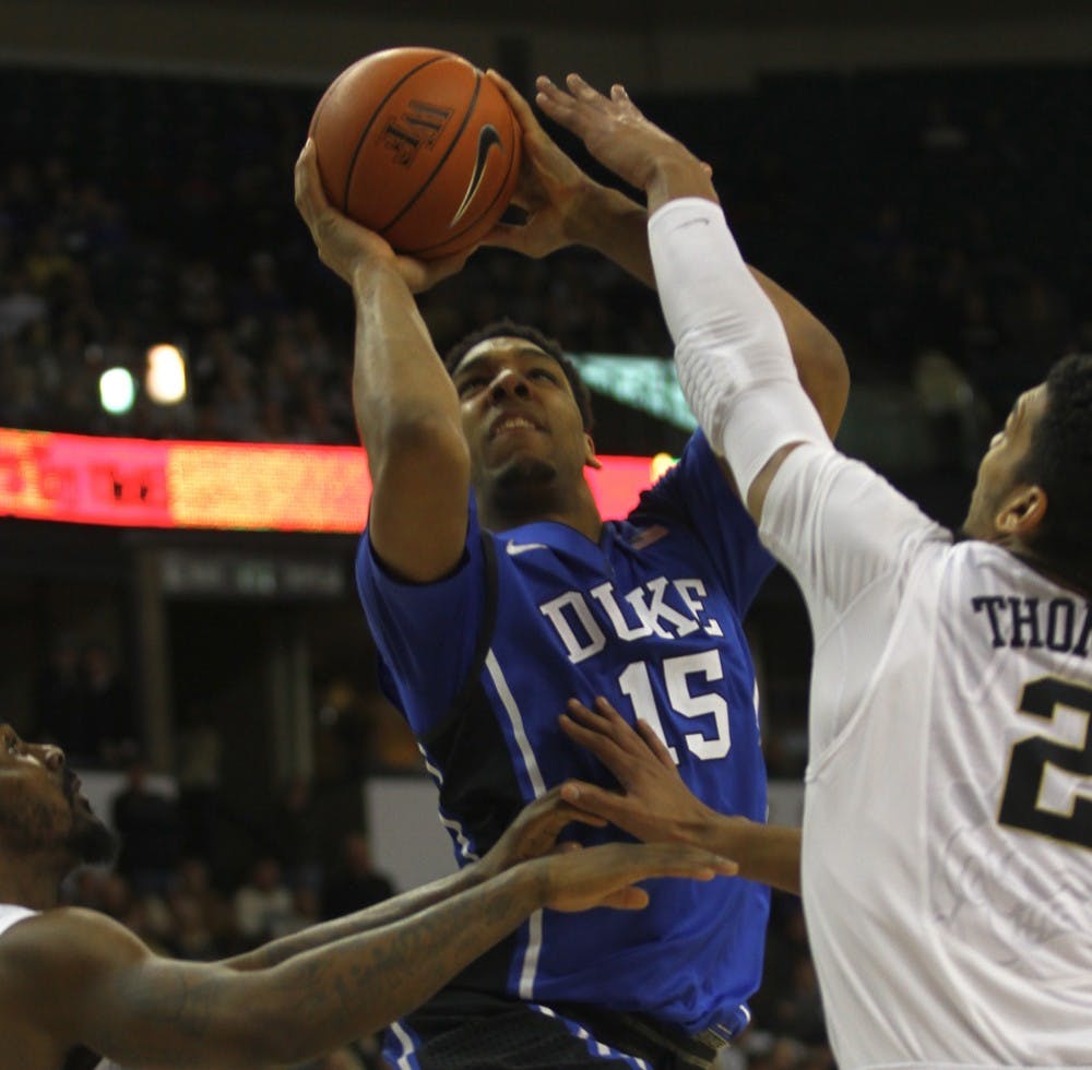 It was the first ACC road game for Jahlil Okafor and Duke's freshmen, but the team's veterans came through in the clutch to avenge last season's loss to Wake Forest.