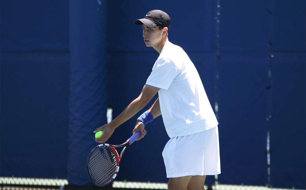 Nicolas Alvarez rallied for a three-set win in singles to lift Duke to victory.