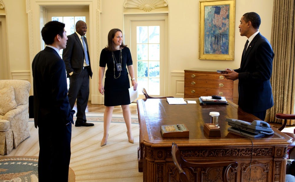 President Barack Obama jokes with Special Assistant Eugene Kang,  Personal Secretary Katie, Johnson and Personal Aide  Reggie Love in the Oval Office 3/5/09. Official White House Photo by Pete Souza 