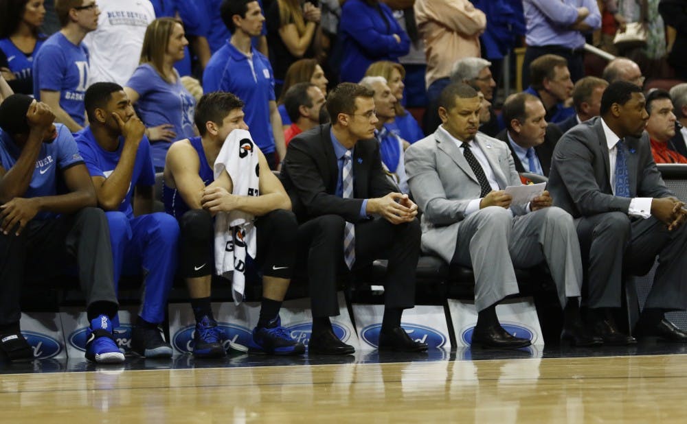 Sophomore Grayson Allen (third from left) had to watch the game's final 3:55 from the bench after fouling out and being whistled for a technical foul in protest to his fifth personal.