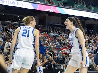 Duke's frontcourt pairing of Camilla Emsbo (left) and Kennedy Brown (right) celebrate during their team's win against Georgia Tech.