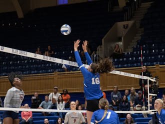 Lizzie Fleming pops the ball up during Duke's win against Virginia.