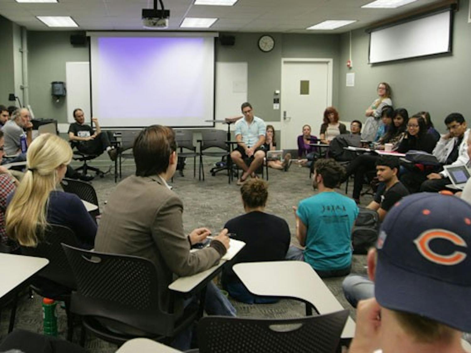 An Occupy Duke group, composed of around 40 students, meets Wednesday in the Social Psychology Building.