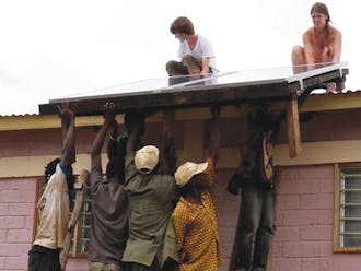 Senior Kathleen Ridgeway and junior Connor Cotton constructed an internet-equipped computer center in Togo. It is powered by solar panels and has the potential to generate revenue for the town.