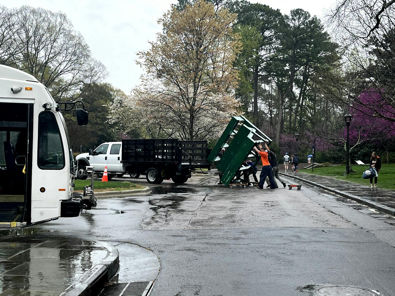 Workers were seen shortly after 1 p.m. Thursday moving benches from West Campus onto a truck.