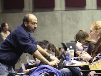 Professor of Biology Mohammed Noor tests out a new "flipped classroom" format, in which students watch lectures pre-recorded on Coursera at home and complete problem sets in class.