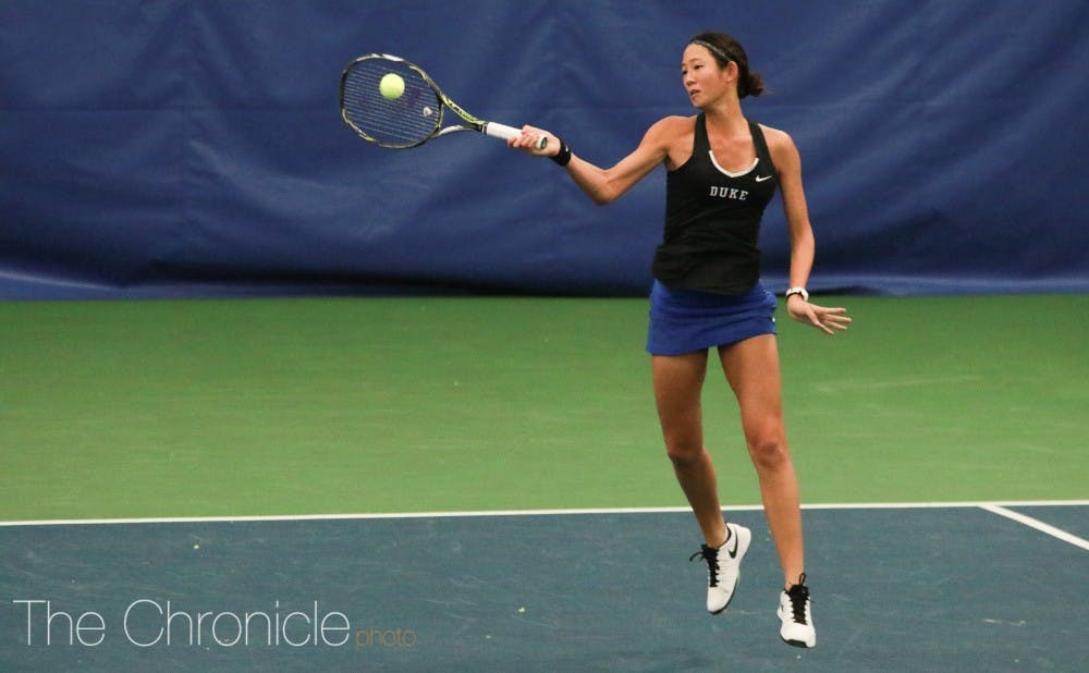 Freshman Meible Chi overcame multiple deficits in her singles match as the Blue Devils outlasted No. 25 Northwestern Sunday afternoon.&nbsp;