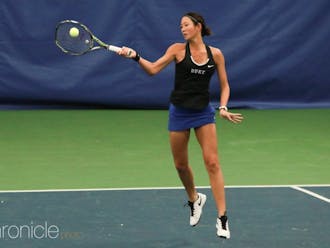 Freshman Meible Chi overcame multiple deficits in her singles match as the Blue Devils outlasted No. 25 Northwestern Sunday afternoon.&nbsp;