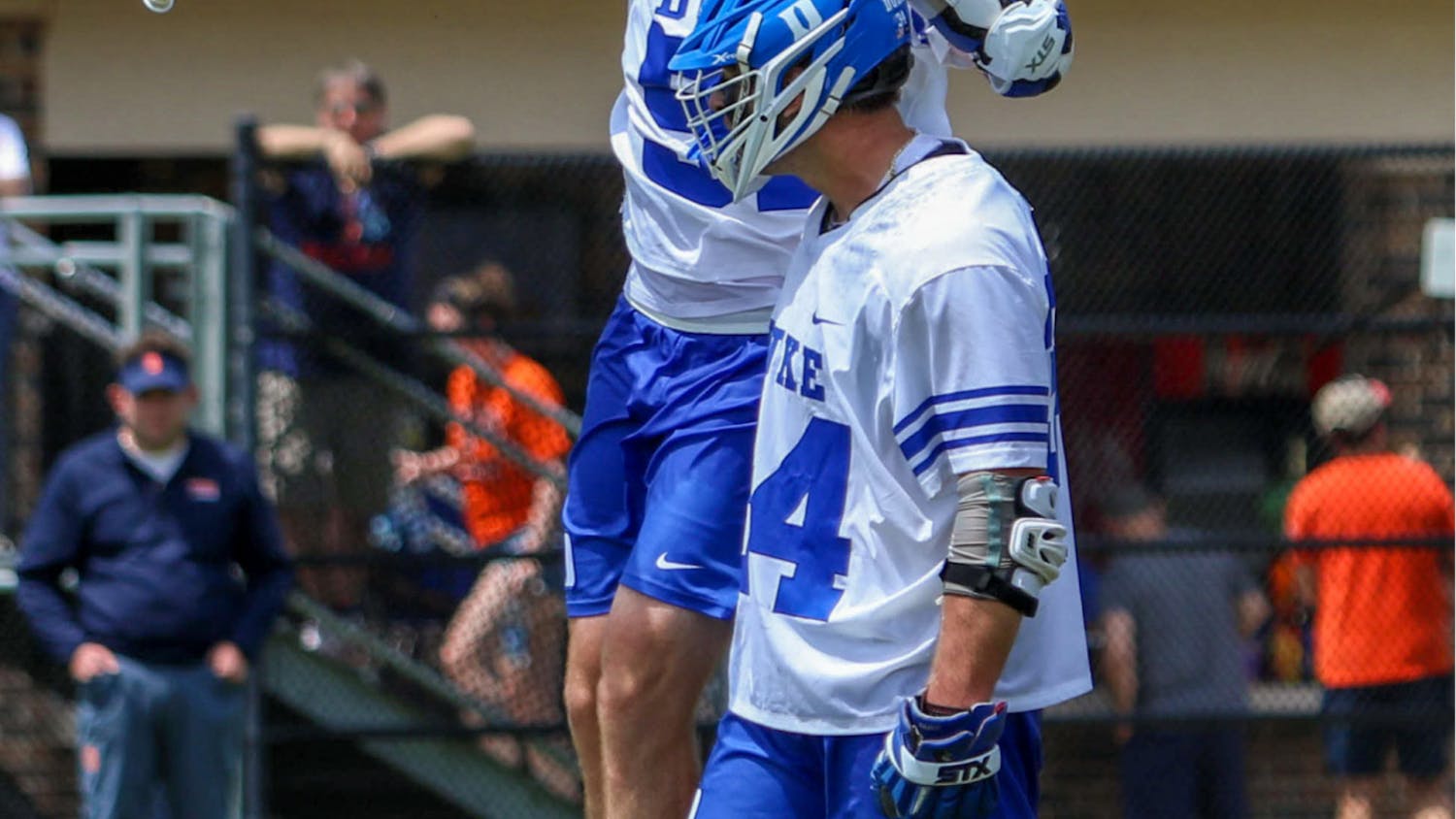 Dyson Williams (left) and Brennan O'Neill (right) celebrate during Duke's ACC-clinching win against Syracuse.