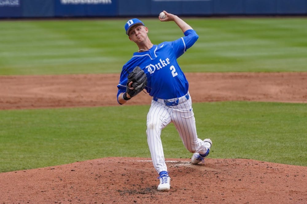 <p>Freshman pitcher Andrew Healy throws in Duke's win against Virginia over the weekend.</p>