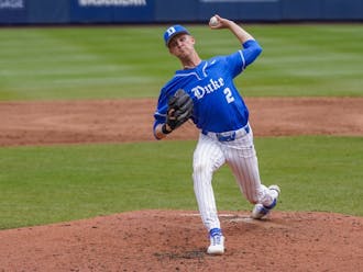 Freshman pitcher Andrew Healy throws in Duke's win against Virginia over the weekend.
