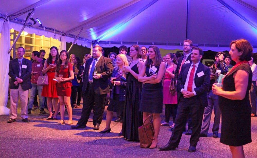 Alumni and students from the Graduate School attended a reception before the homecoming dance.