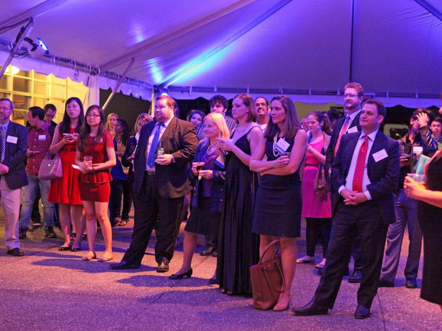 Alumni and students from the Graduate School attended a reception before the homecoming dance.