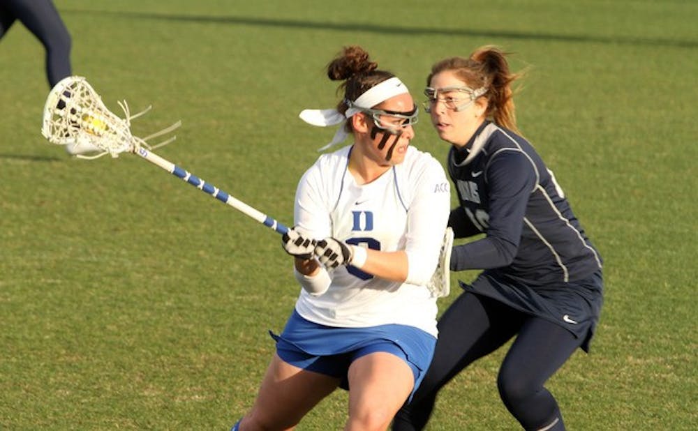 Senior attacker Kerrin Maurer notched a team-high four points on two goals and two assists and also won a career-best nine draws as the Blue Devils defeated Davidson on the road Tuesday night.