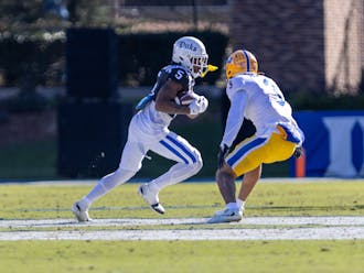 Jalon Calhoun speeds by a Pittsburgh defender in Duke's Saturday victory.