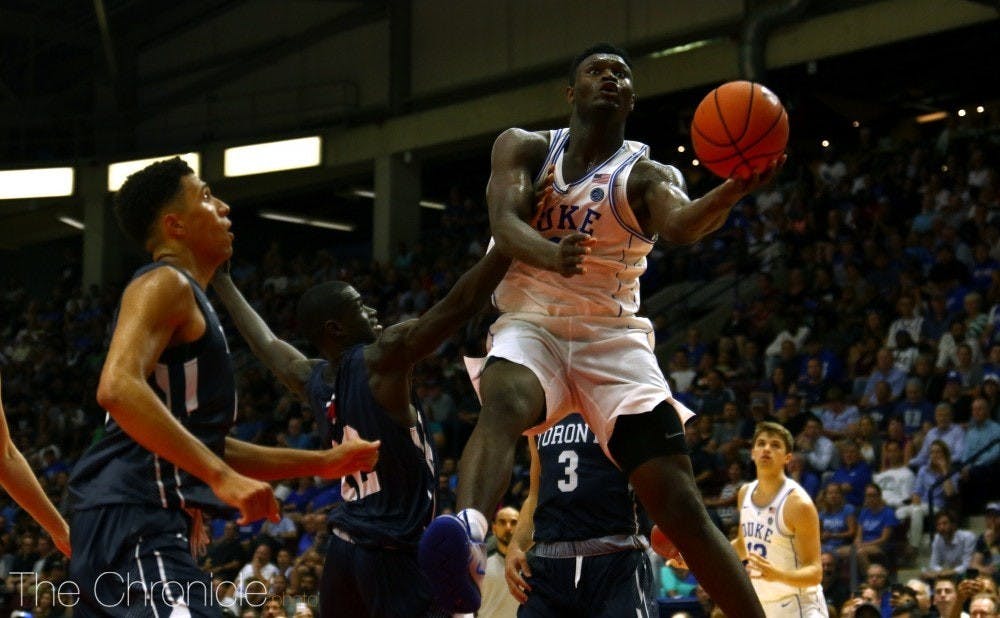 Zion Williamson wowed fans with several dunks and led the White team to victory at Countdown to Craziness Friday.