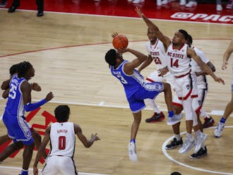 Jeremy Roach puts up a shot during the first half of Duke's lopsided loss at N.C. State.