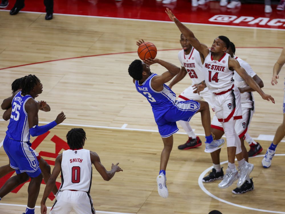 Jeremy Roach puts up a shot during the first half of Duke's lopsided loss at N.C. State.