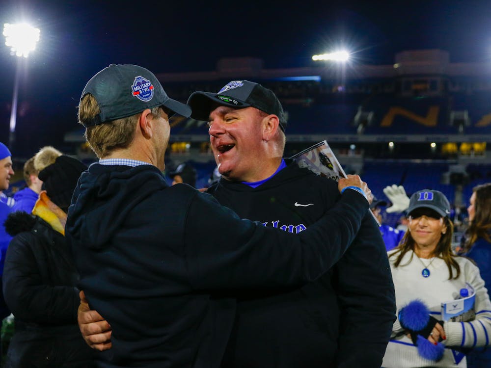 Duke football head coach Mike Elko celebrates his squad's Military Bowl win in December 2022.