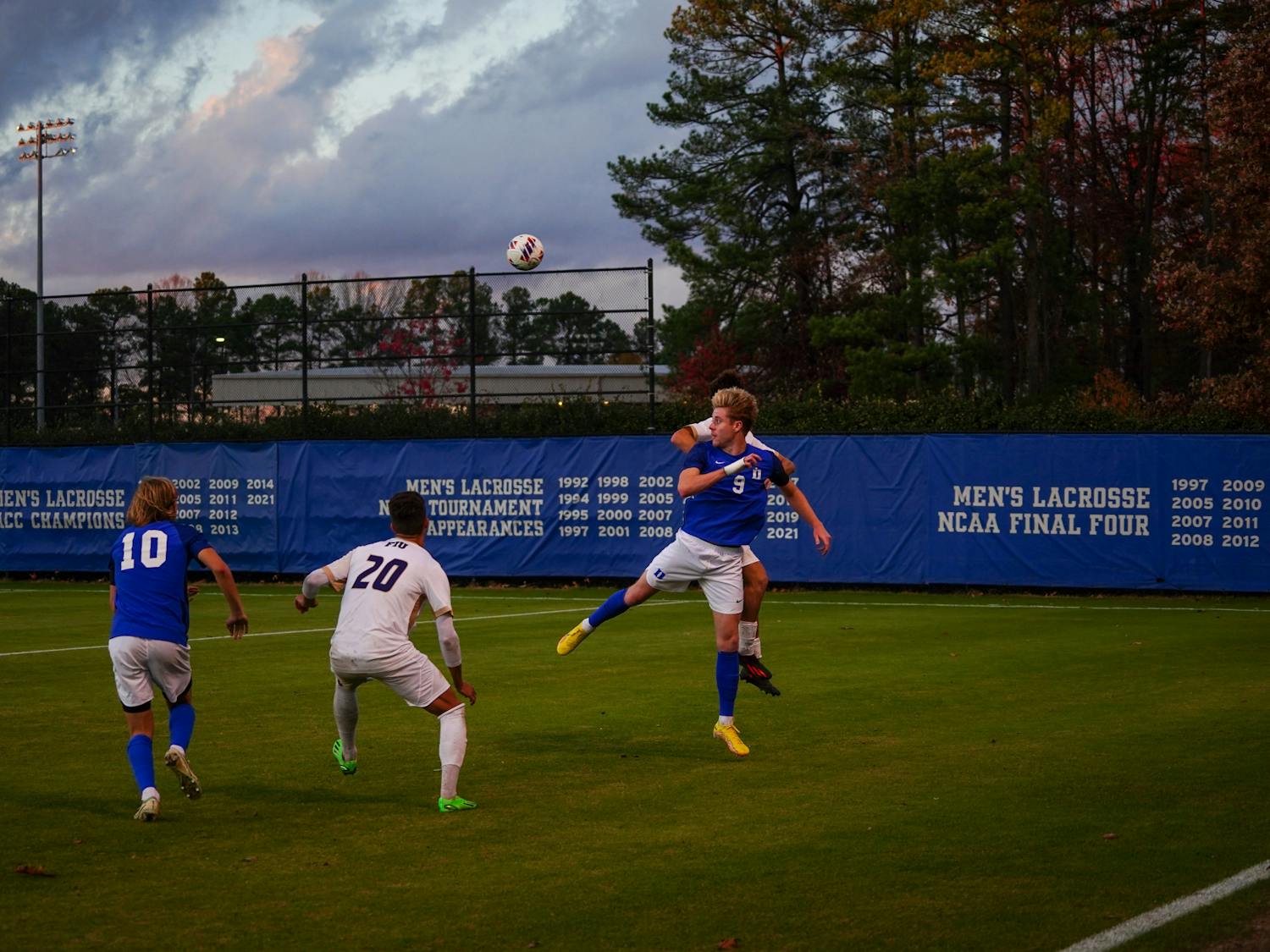 Senior forward Scotty Taylor (center) scored the match's only goal late in the first half.