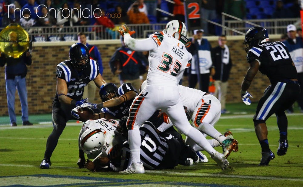 Duke wide receiver Johnell Barnes extended into the end zone to trim the Miami lead to 24-19 late in the fourth quarter.