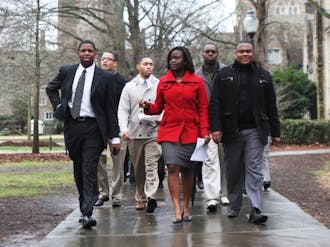 Approximately 20 members of the Black Student Alliance walked to the Allen Building Tuesday morning with a  document outlining their concerns.