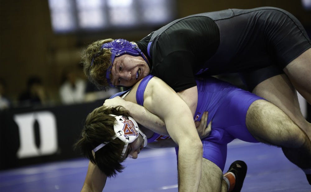 <p>Redshirt senior Conner Hartmann needed just 50 seconds to send off his opponent Sunday against American as the Blue Devils picked up a pair of wins.</p>