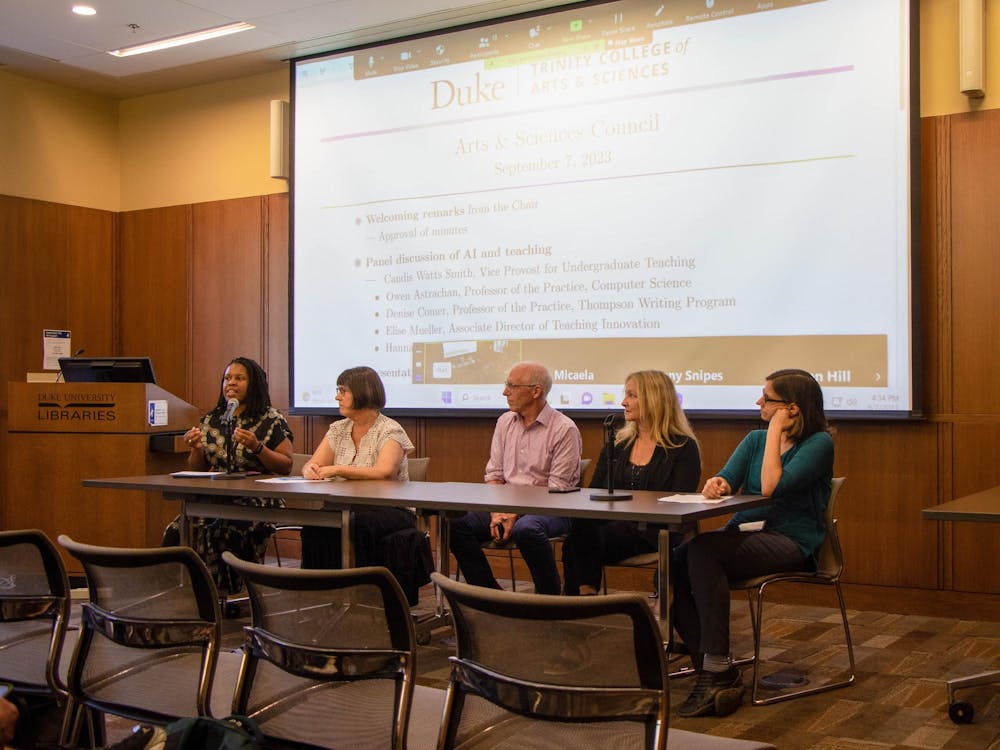 <p>A panel of faculty members discuss the uses of AI in the classroom at Thursday's meeting.</p>