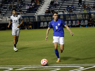 Peter Stroud directs play from the midfield in Duke men's soccer's September 2022 tie against Yale.
