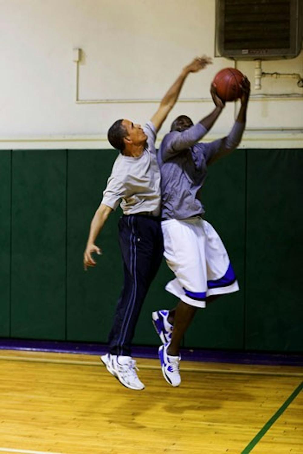 President Barack Obama plays basketball with personal aide Reggie Love at St. Bartholomew (St. Bart's) Church in New York, N.Y. on Sept. 23, 2009.   (Official White House photo by Pete Souza)This official White House photograph is being made available only for publication by news organizations and/or for personal use printing by the subject(s) of the photograph. The photograph may not be manipulated in any way and may not be used in commercial or political materials, advertisements, emails, products, promotions that in any way suggests approval or endorsement of the President, the First Family, or the White House. 