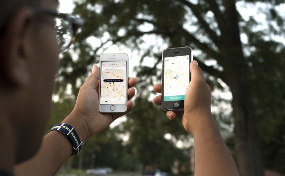Students can request services from Uber and Lyft ride-sharing companies through their phones, the popularity of which has caused Durham cab companies to adjust their business models.