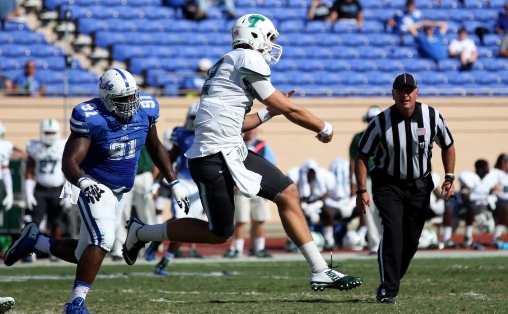 Tulane quarterback Tanner Lee tossed three interceptions against the Blue Devils in Durham last year but will look to turn in a better performance in Thursday night's season opener.