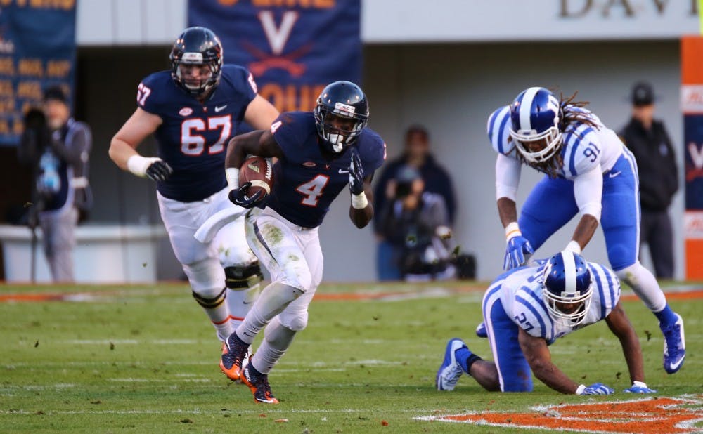 <p>Virginia's Taquan "Smoke" Mizzell accounted for three of Virginia's six touchdowns Saturday as the Cavaliers torched the Blue Devils with several explosive plays.</p>