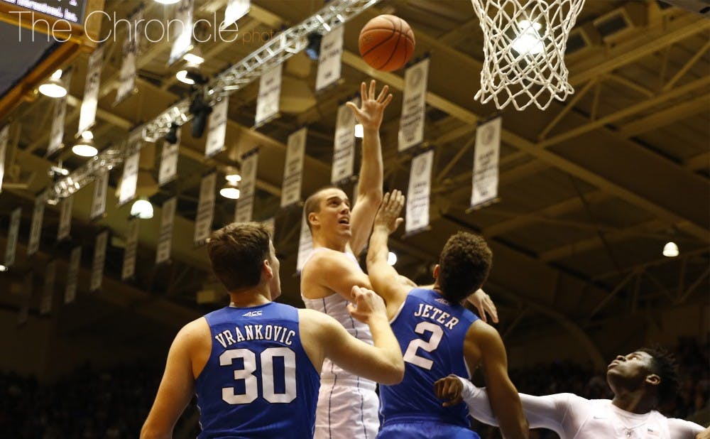 Duke head coach Mike Krzyzewski noted the aggressive tone that center Marshall Plumlee set for the scrimmage with several thunderous dunks.