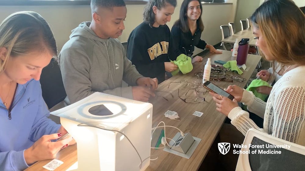Courtesy of a video from Wake Forest University School of Medicine's "Medical Students Collect 600+ Prescription Glasses for Underserved Communities" article. https://school.wakehealth.edu/features/education/medical-students-collect-600-prescription-glasses-for-underserved-communities