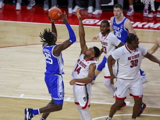 Mark Mitchell works the paint against N.C. State