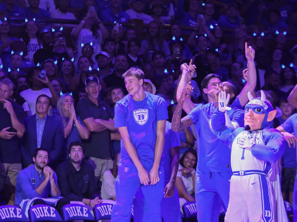 <p>Flagg celebrates with his teammates during Countdown to Craziness.</p>