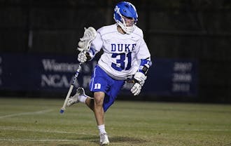 Jordan Wolf scored four goals and tallied three assists in Duke’s 19-11 win against Marist.